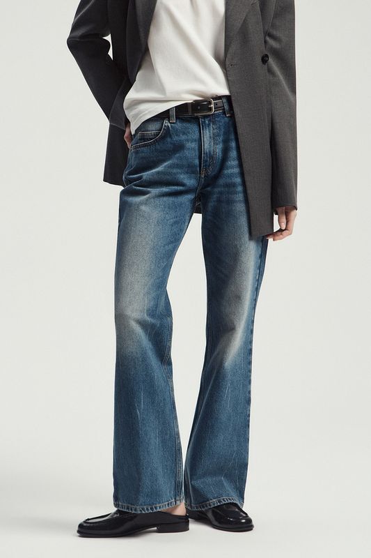 Джинсы с клеш от колена Nume